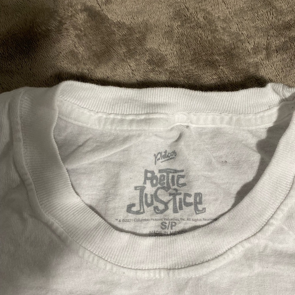 A white Tupac shirt
